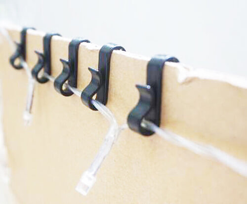 Use gutter hooks to hold your fairy lights