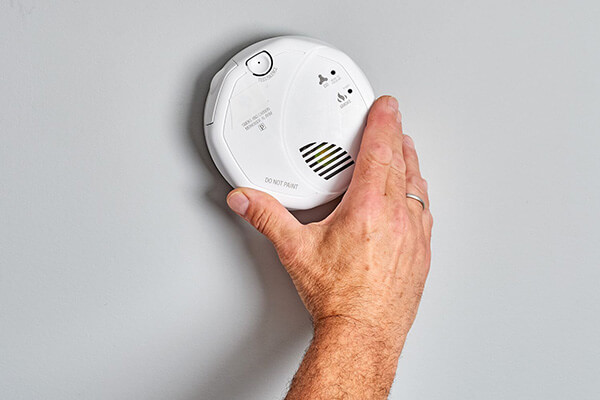 Smoke alarms should be installed by a licensed electrician